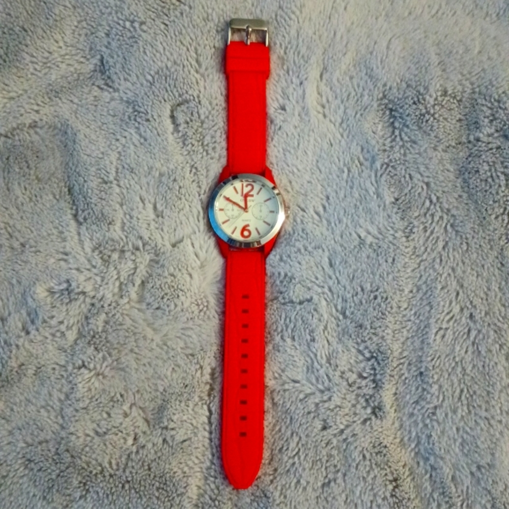NWOT Chico's watch. Red silicone band, stainless steel. No scratches